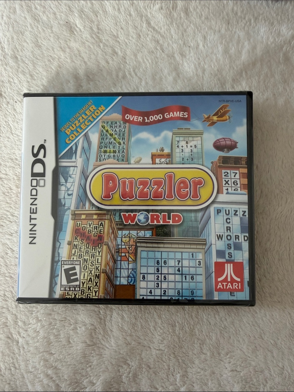Nintendo DS Puzzler World Case with Red, Blue, Yellow Artwork